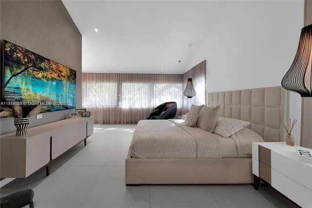 a bathroom with a double vanity sink mirror and shower