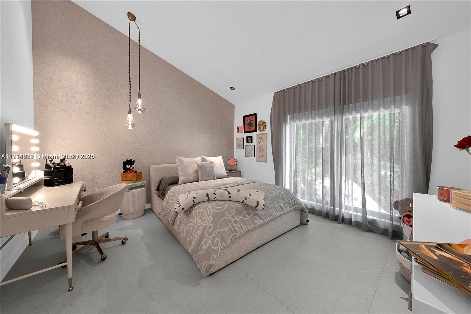 3760 Douglas Road Miami, FL 33133 - Photo 53 of 70 a spacious bedroom with a bed and a window