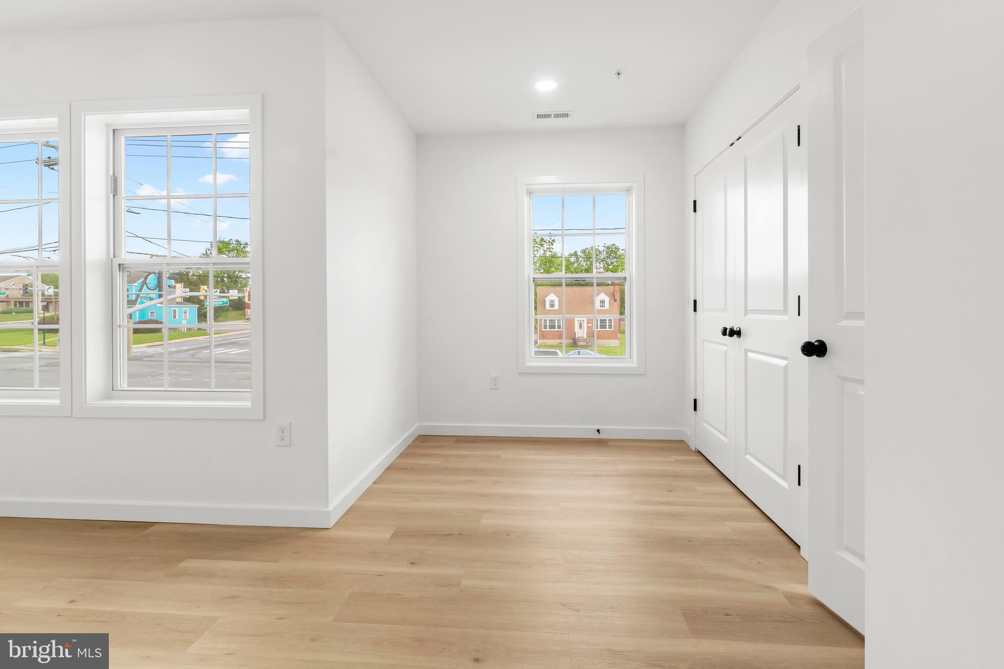 7817 Liberty Road Windsor Mill, MD 21244 - Photo 44 of 50 an empty room with windows