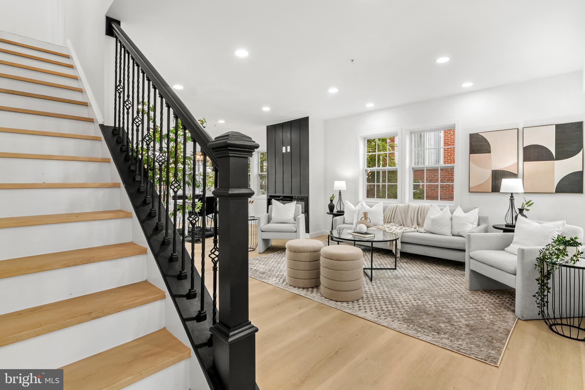 7817 Liberty Road Windsor Mill, MD 21244 - Photo 5 of 50 a living room with furniture or stairs and a wooden floor