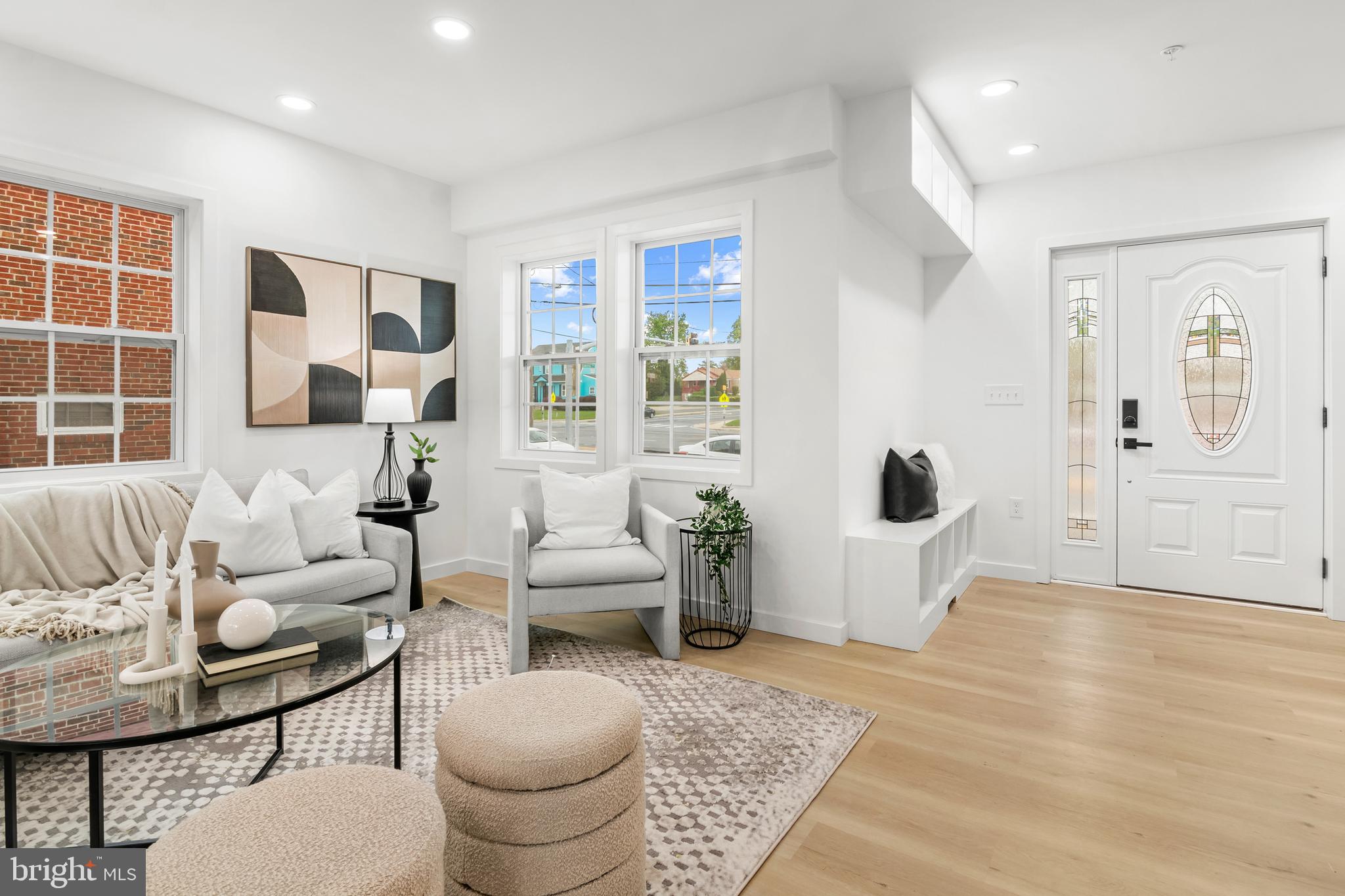 7817 Liberty Road Windsor Mill, MD 21244 - Photo 9 of 50 a living room with furniture and a large window