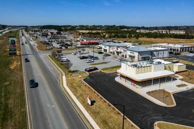 a view of a balcony with chairs