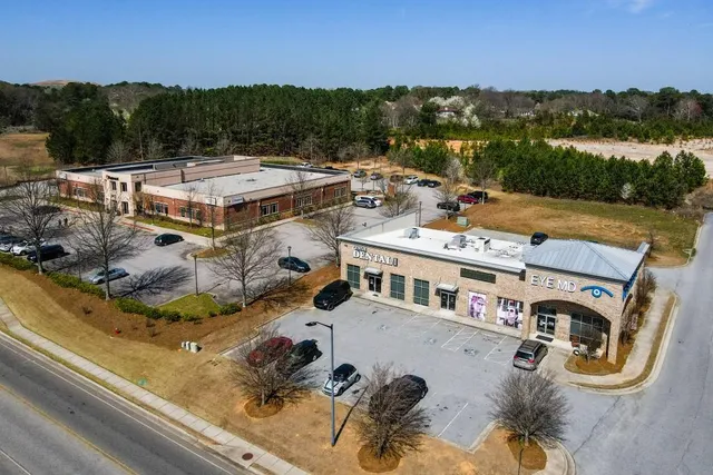 aerial view of a house with outdoor space