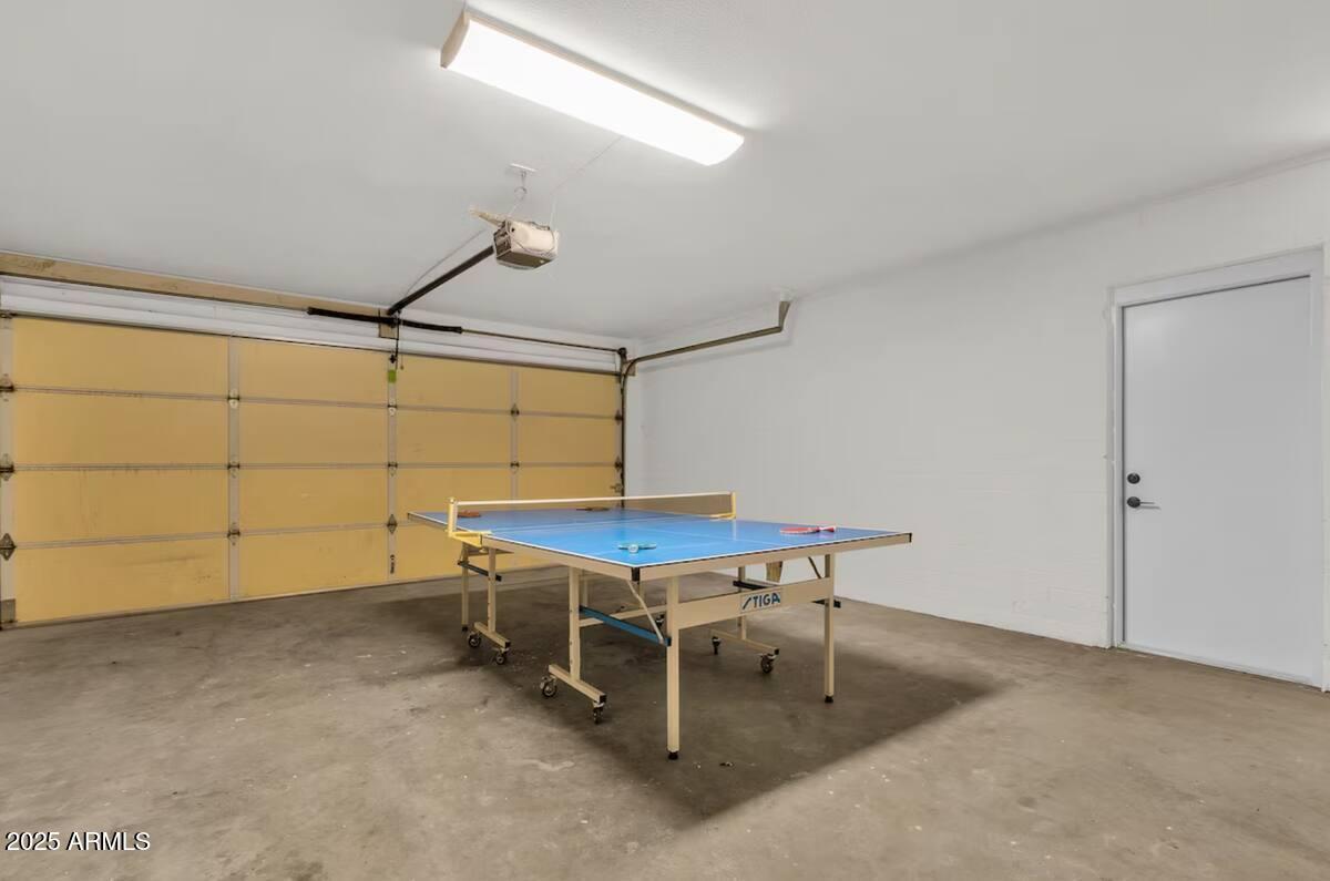 2452 East Manhatton Drive Tempe, AZ 85282 - Photo 13 of 25 a room with a table and chairs