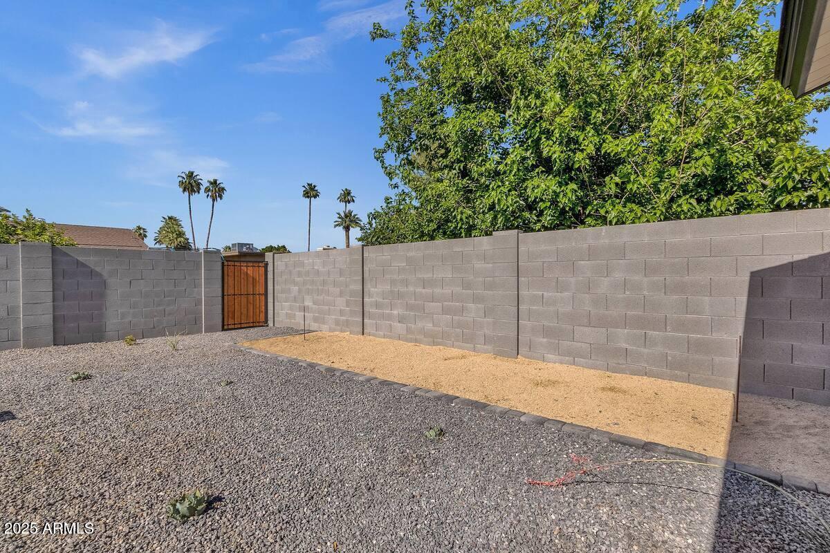 2452 East Manhatton Drive Tempe, AZ 85282 - Photo 22 of 25 a view of a backyard
