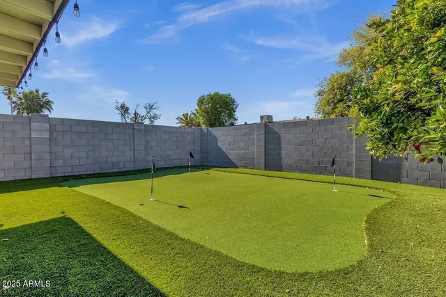 a view of an outdoor space and swimming pool