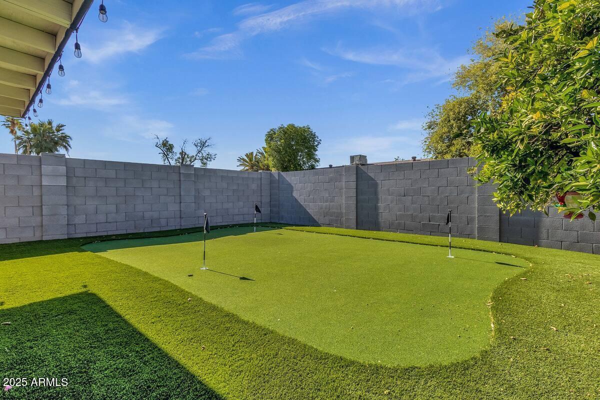 2452 East Manhatton Drive Tempe, AZ 85282 - Photo 25 of 25 a view of an outdoor space and swimming pool