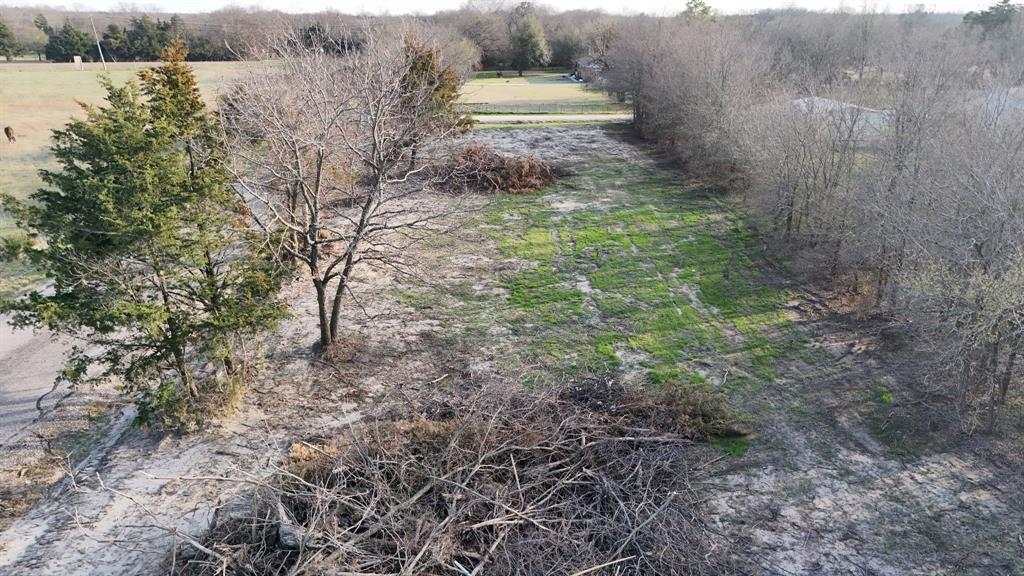 16 Ranch Rd Circle Farmersville, TX 75442 - Photo 12 of 16 a view of a yard with mountain and wooden fence