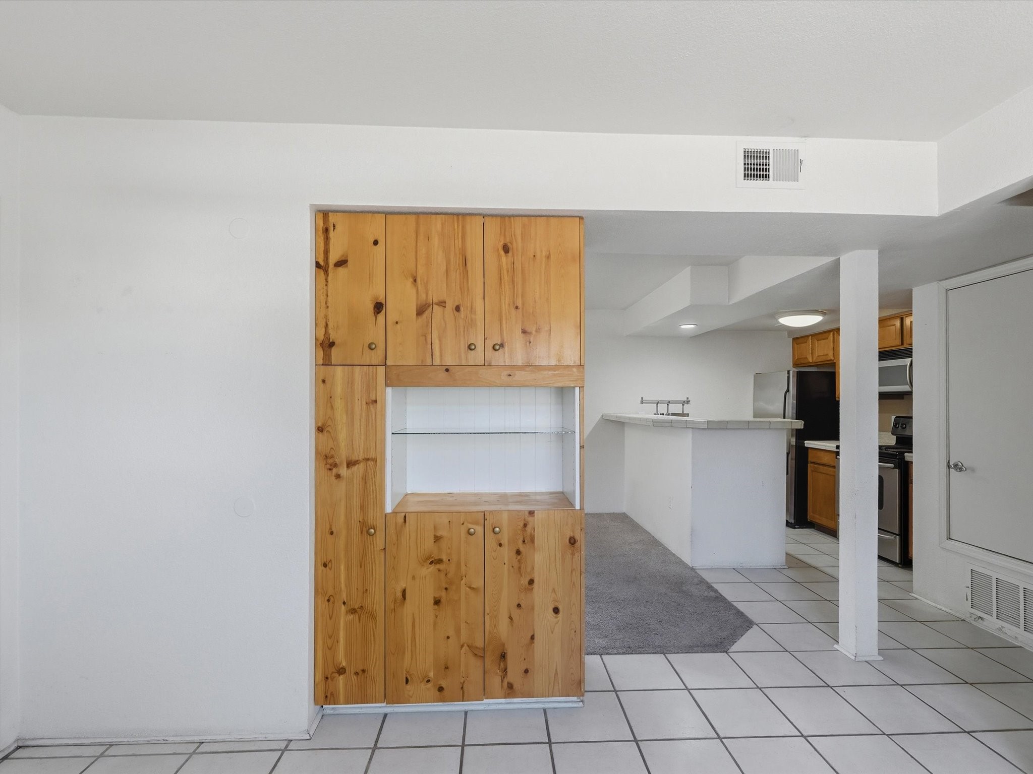 2210 Miguel Chavez Road, Unit 411 Santa Fe, NM 87505 - Photo 5 of 59 From the dining area walk is a direct access to the kitchen and living space