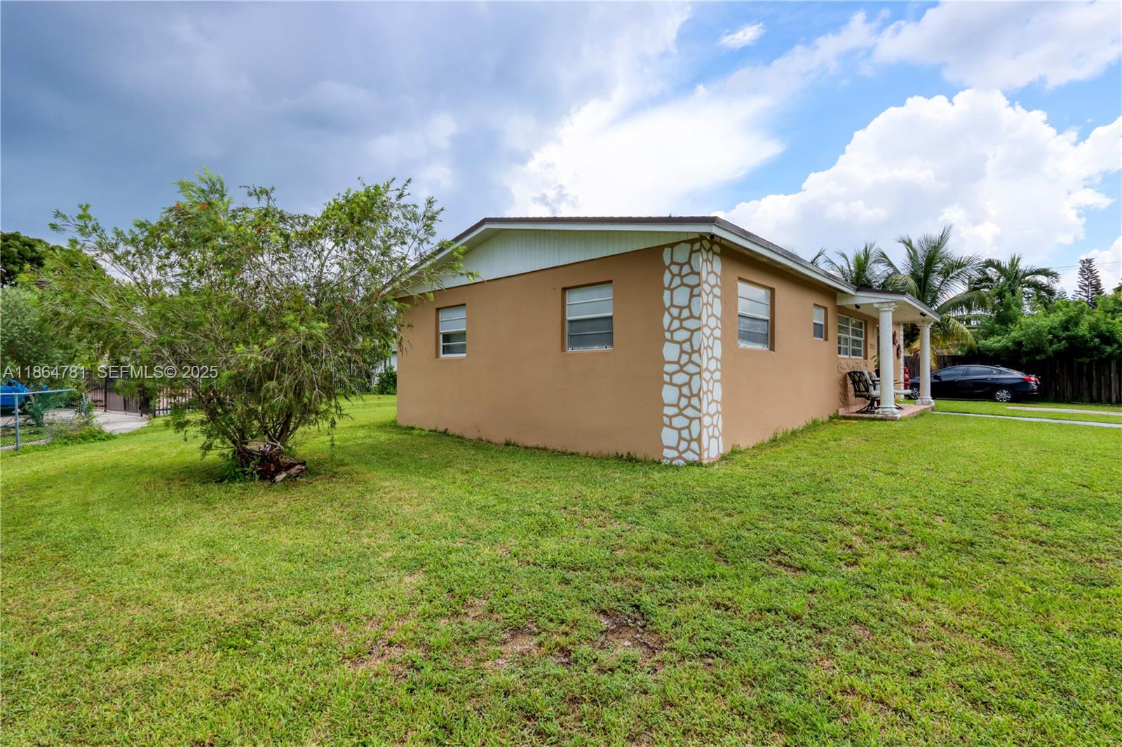30211 Southwest 158th Road Homestead, FL 33033 - Photo 13 of 47 a view of backyard of house with green space