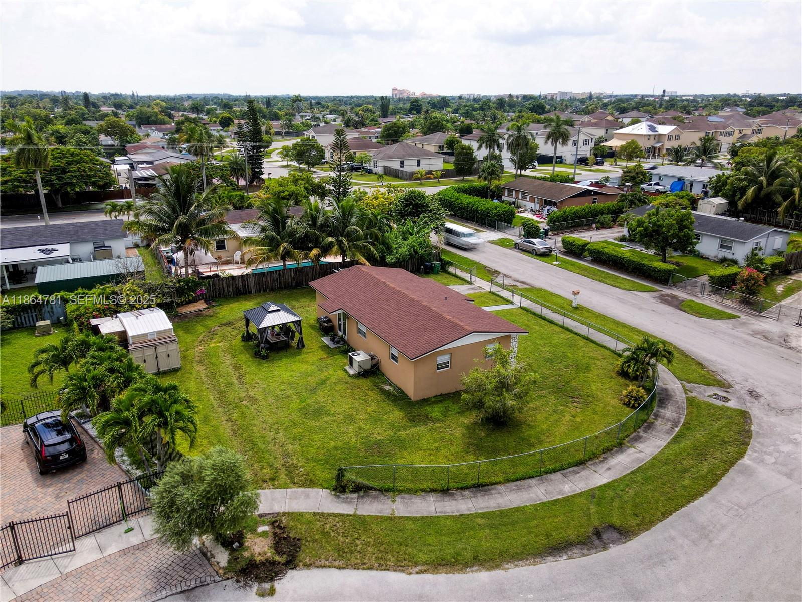 30211 Southwest 158th Road Homestead, FL 33033 - Photo 20 of 47 a view of a swimming pool with a yard