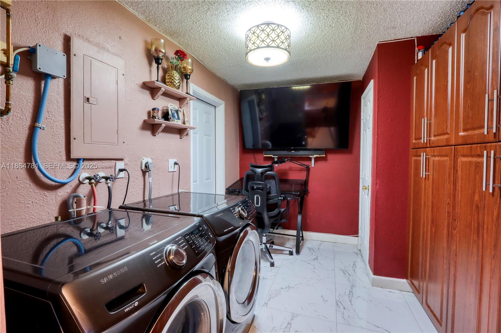 30211 Southwest 158th Road Homestead, FL 33033 - Photo 40 of 47 a view of a room with gym equipment