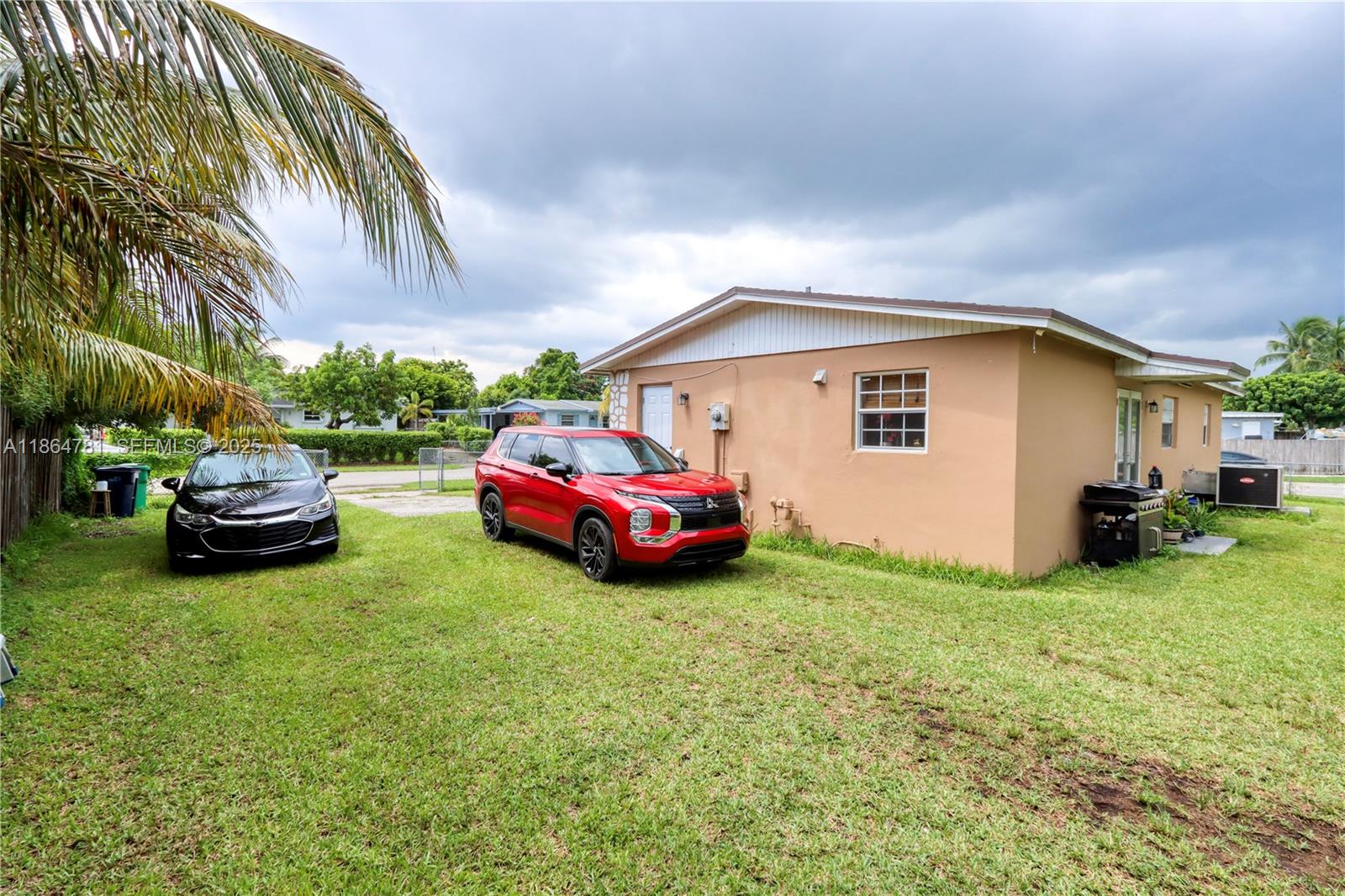 30211 Southwest 158th Road Homestead, FL 33033 - Photo 7 of 47 a view of a house with backyard tub and couches