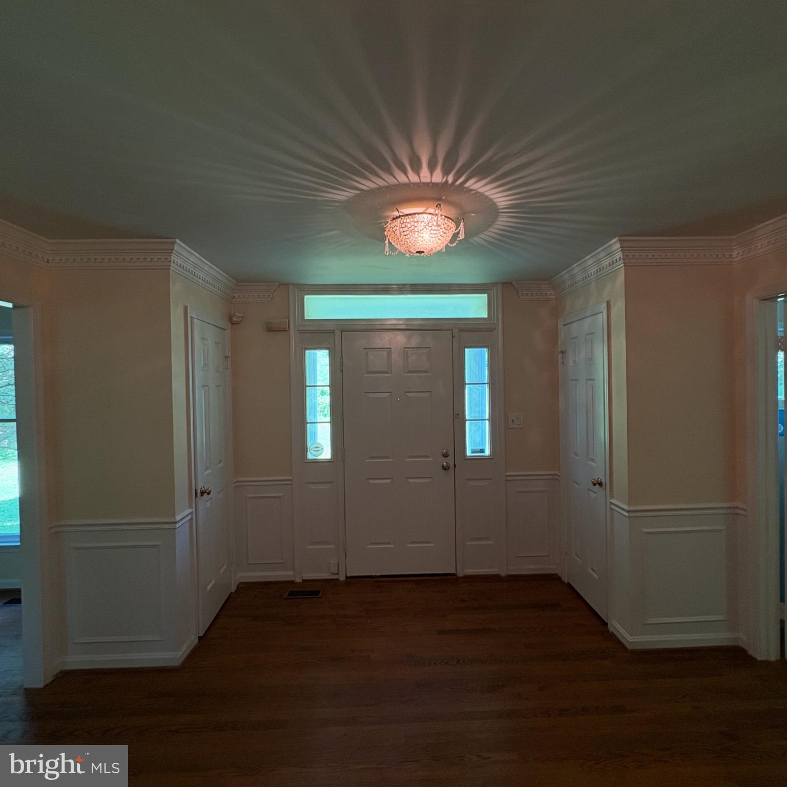 3502 Holly Road Annandale, VA 22003 - Photo 33 of 57 an empty room with wooden floor and windows
