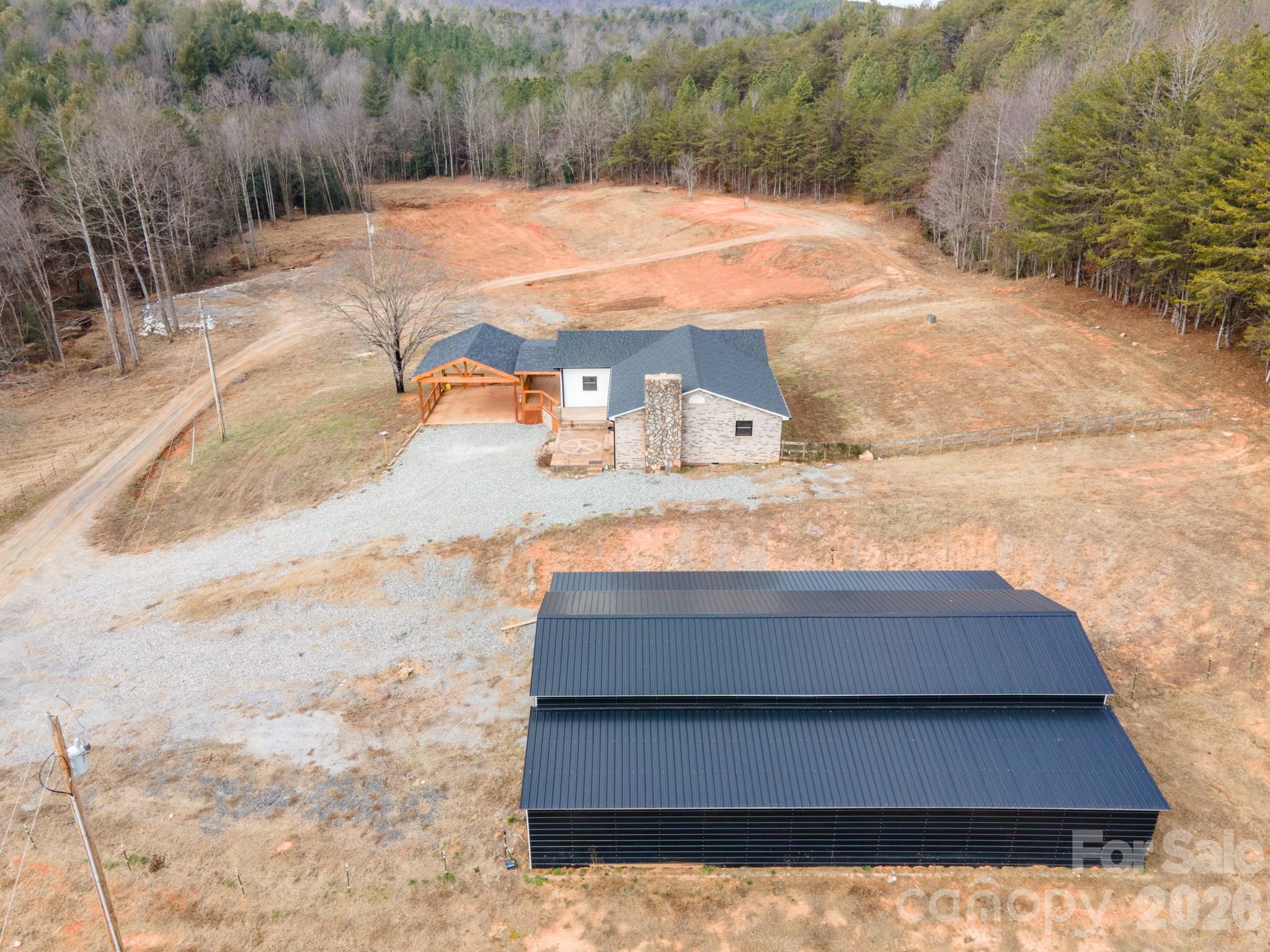 7400 Corn Hill Road Connelly Springs, NC 28612 - Photo 35 of 41 a backyard of a house