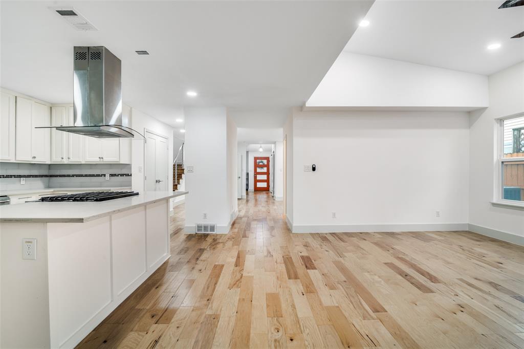 8722 Angora Street Dallas, TX 75218 - Photo 6 of 26 a view of a kitchen with wooden floor