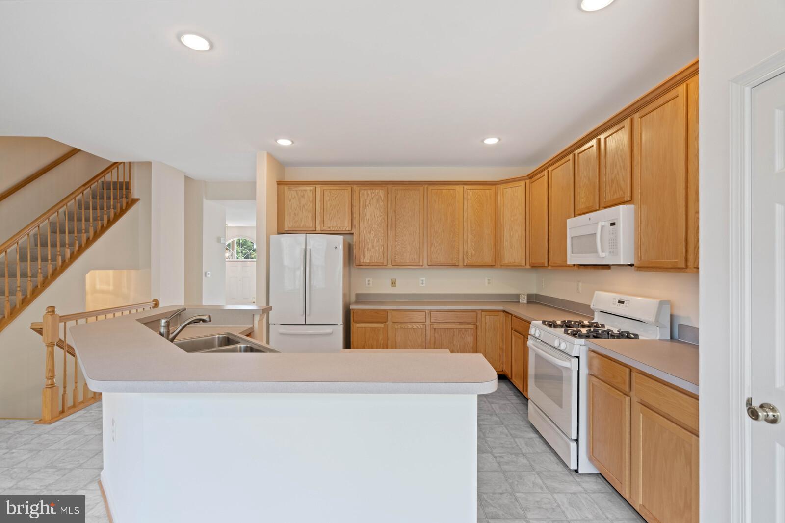 21508 Tamarack Ridge Square Sterling, VA 20164 - Photo 11 of 45 Island with plenty of room for seating