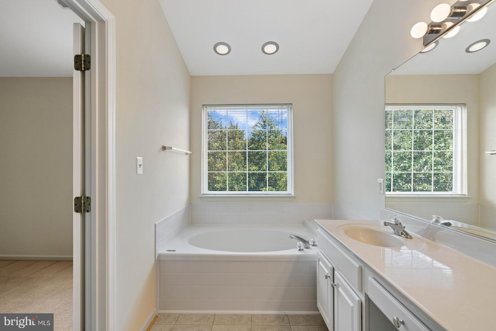 21508 Tamarack Ridge Square Sterling, VA 20164 - Photo 21 of 45 Primary bath with separate shower and soaking tub