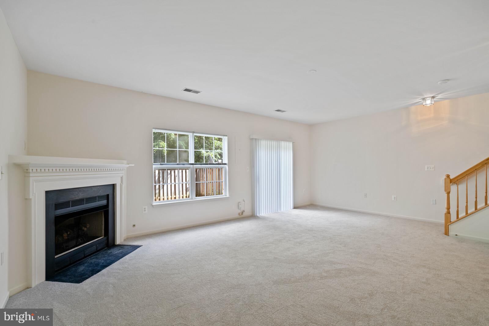 21508 Tamarack Ridge Square Sterling, VA 20164 - Photo 23 of 45 Large lower level rec room with gas fireplace