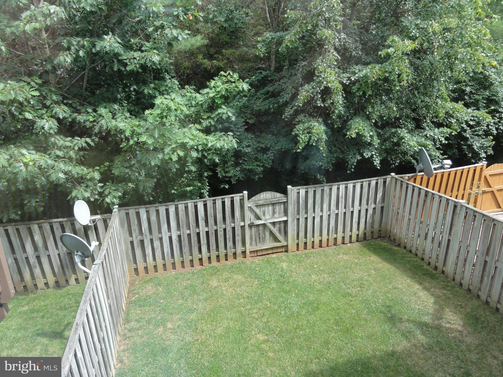 21508 Tamarack Ridge Square Sterling, VA 20164 - Photo 36 of 45 Fenced back yard. Backs to trees for privacy!