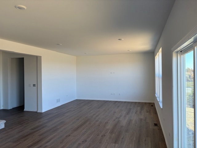 102 Ellis Road Algonquin, IL 60102 - Photo 3 of 45 wooden floor in an empty room with a window