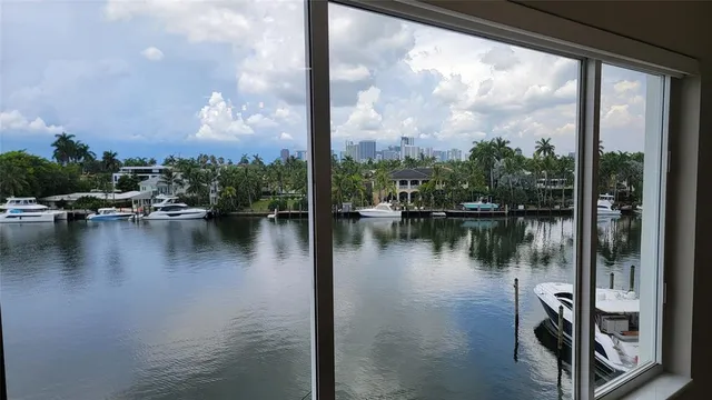 a bathroom with double sink and a mirror