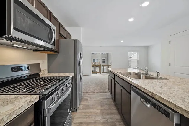 a kitchen with a stove and a kitchen