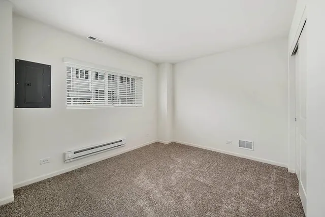 an empty room with windows