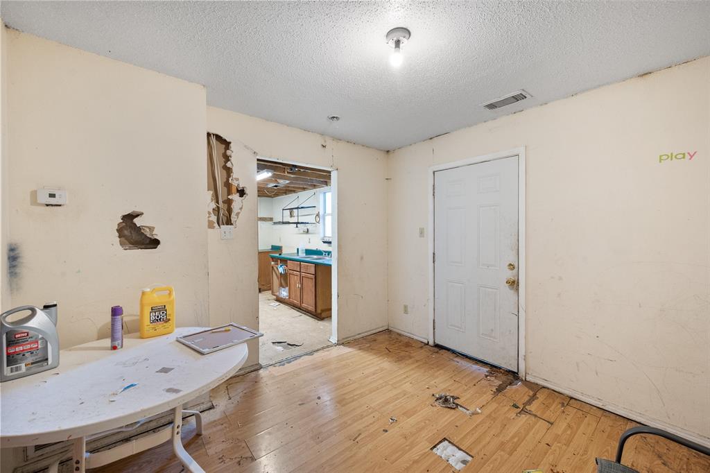 1014 Southwest 3070 Purdon, TX 76679 - Photo 3 of 10 Dining room area leading into the kitchen