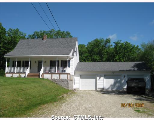 77 Bates Pond Road Canterbury, CT 06331 - Photo 1 of 1 a aerial view of a house with a garden