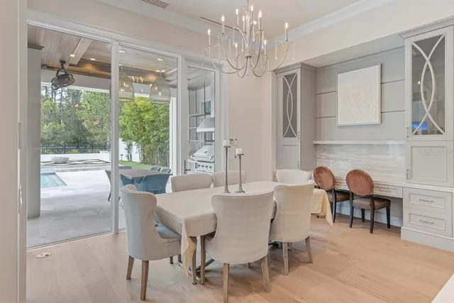 a kitchen with cabinets a washer and dryer
