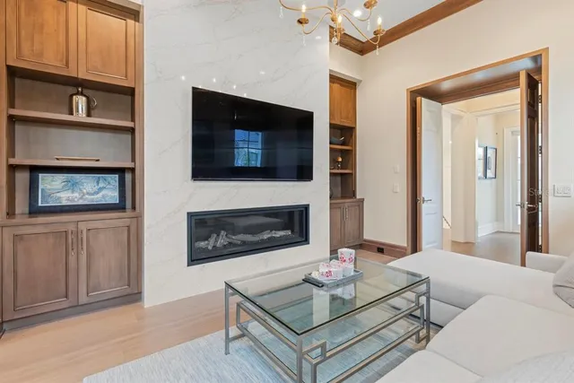 a white bath tub sitting in front of a window