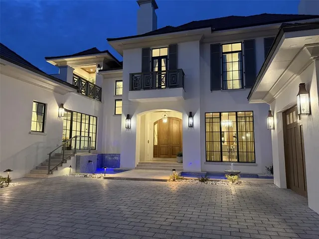 a front view of a building with glass windows