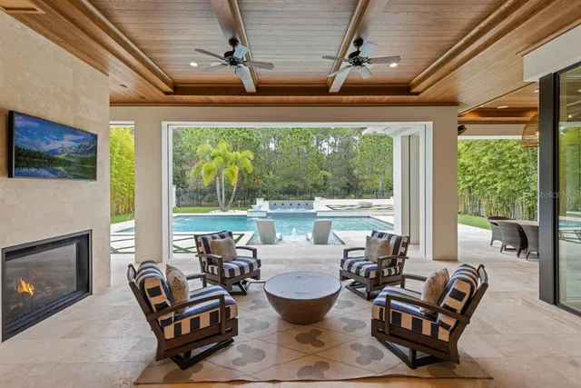 a view of a swimming pool with a patio