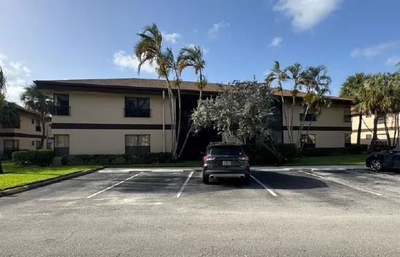 a car parked in front of a house