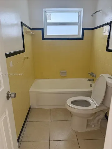 a front view of a house with a porch