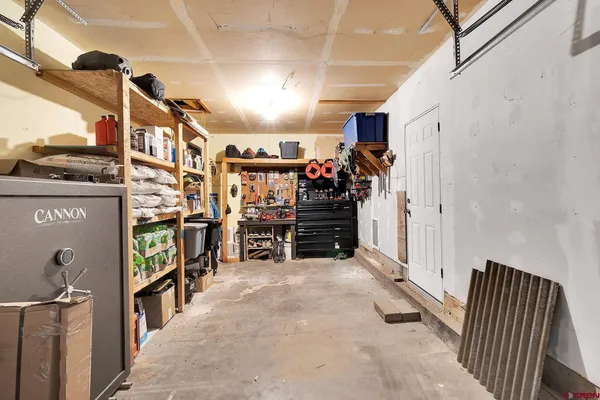 a kitchen with stainless steel appliances a refrigerator stove microwave and sink