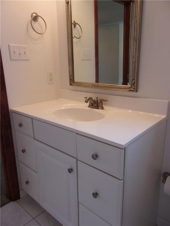 2288 Reis Run Road Pittsburgh, PA 15237 - Photo 17 of 23 Full vanity, newer fixtures and mirror in master bathroom.