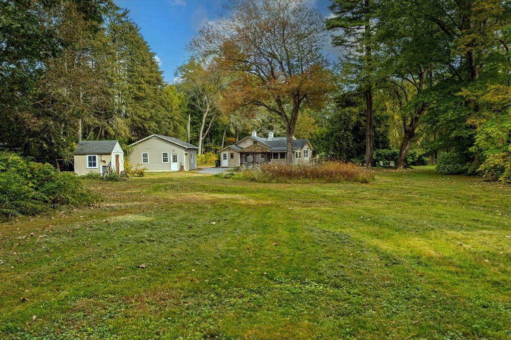 767 Stony Hill Road Wilbraham, MA 01095 - Photo 7 of 11 a view of swimming pool is middle in the garden