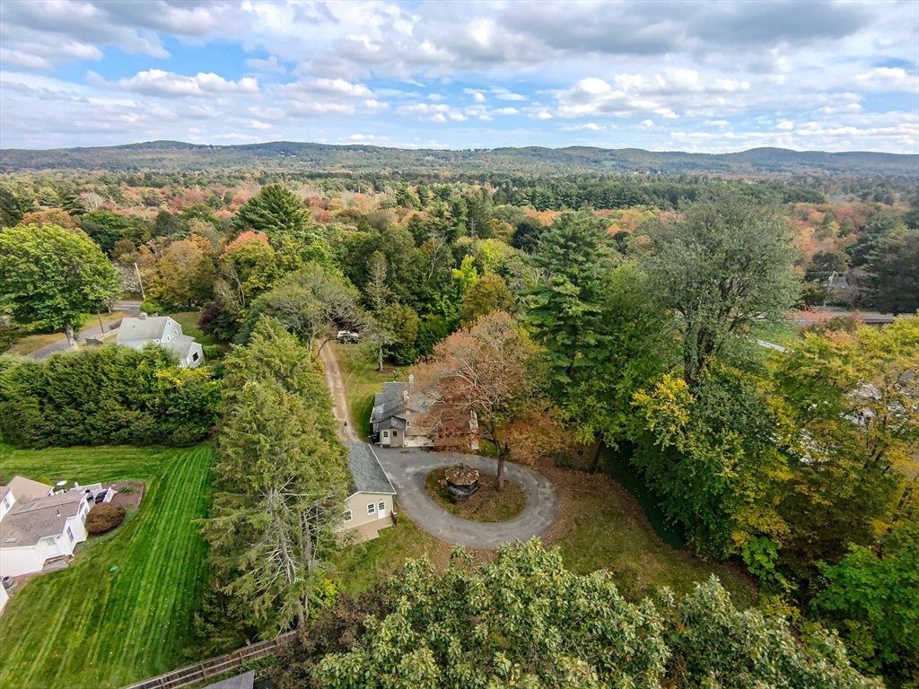 767 Stony Hill Road Wilbraham, MA 01095 - Photo 9 of 11 an aerial view of residential houses with outdoor space