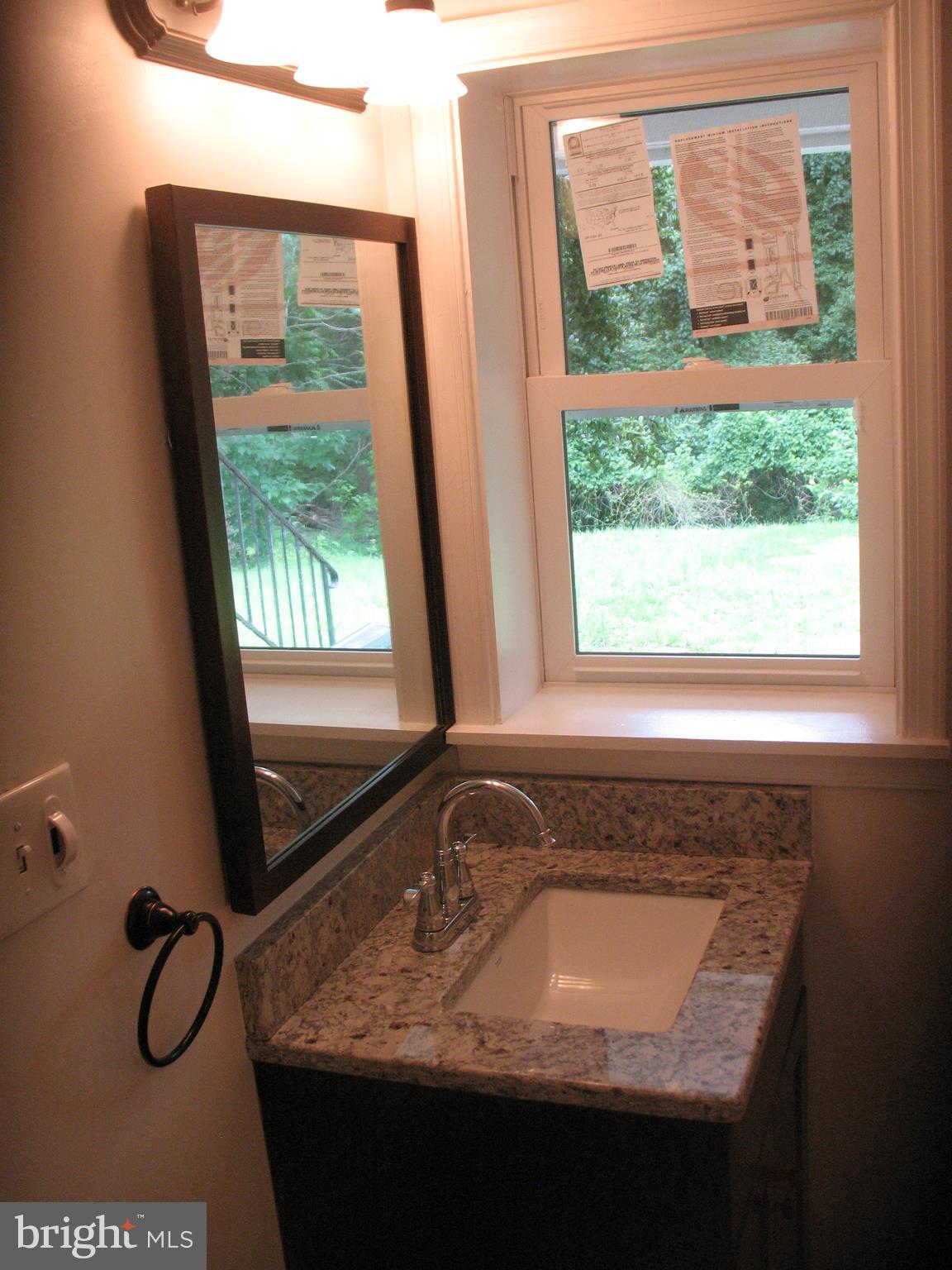 5110 Sharon Road Temple Hills, MD 20748 - Photo 22 of 30 full bathroom basement with granite counter-top