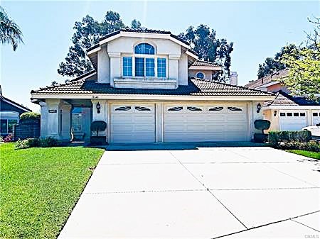 17346 Cold Spring Circle Riverside, CA 92503 - Photo 1 of 1 a front view of a house with a yard