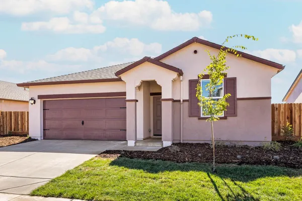 a front view of house with yard