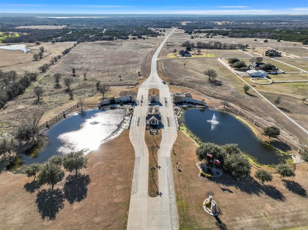 38107 Misty Ridge Drive Whitney, TX 76692 - Photo 4 of 8 an aerial view of residential houses with outdoor space