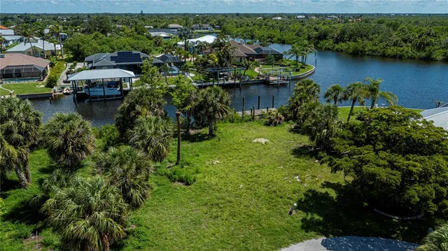 a view of backyard with swimming pool