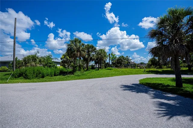 a view of a golf course with a house