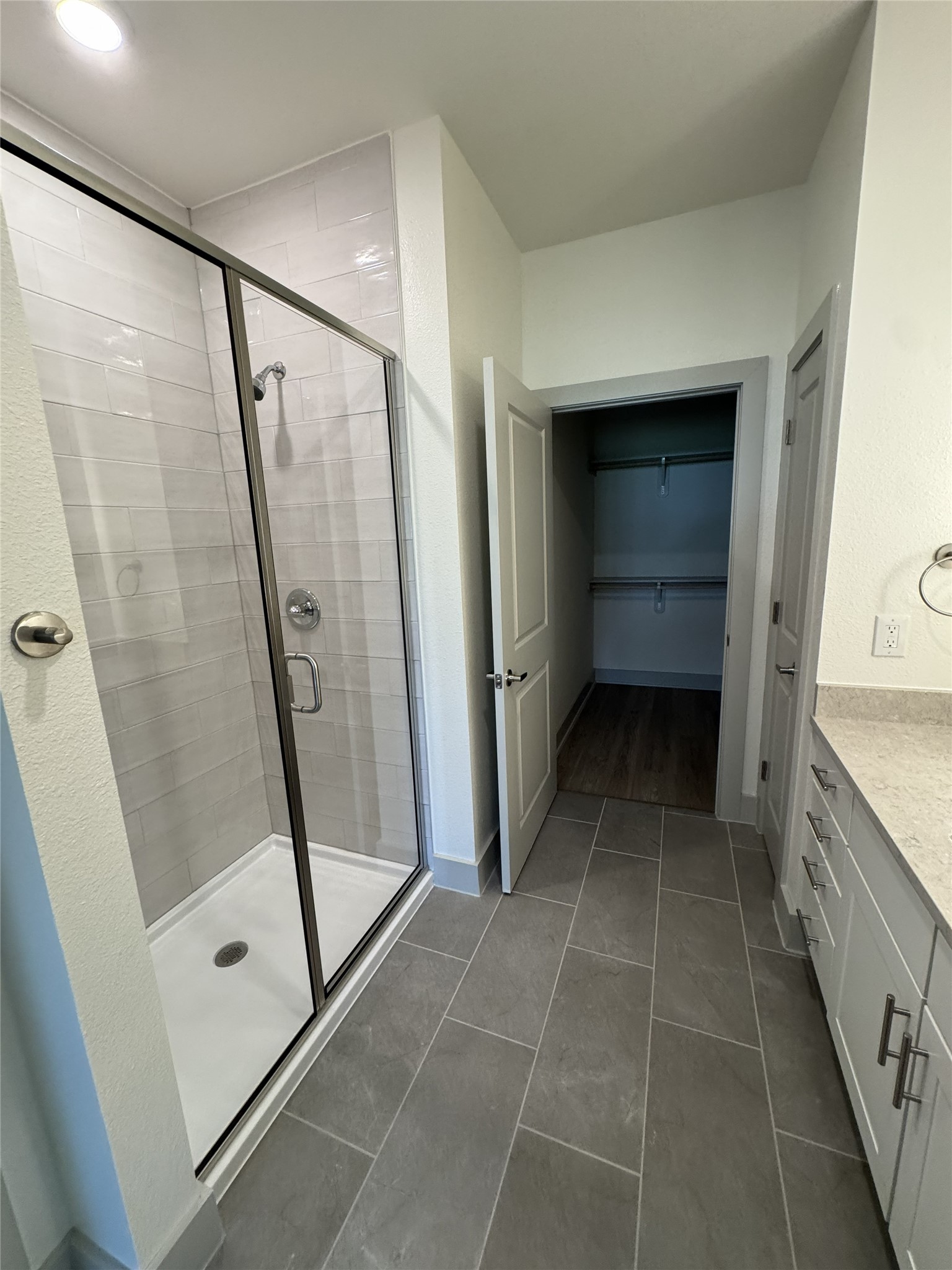 26244 Twin Oaks Road Splendora, TX 77372 - Photo 8 of 10 a bathroom with a tub shower and a sink