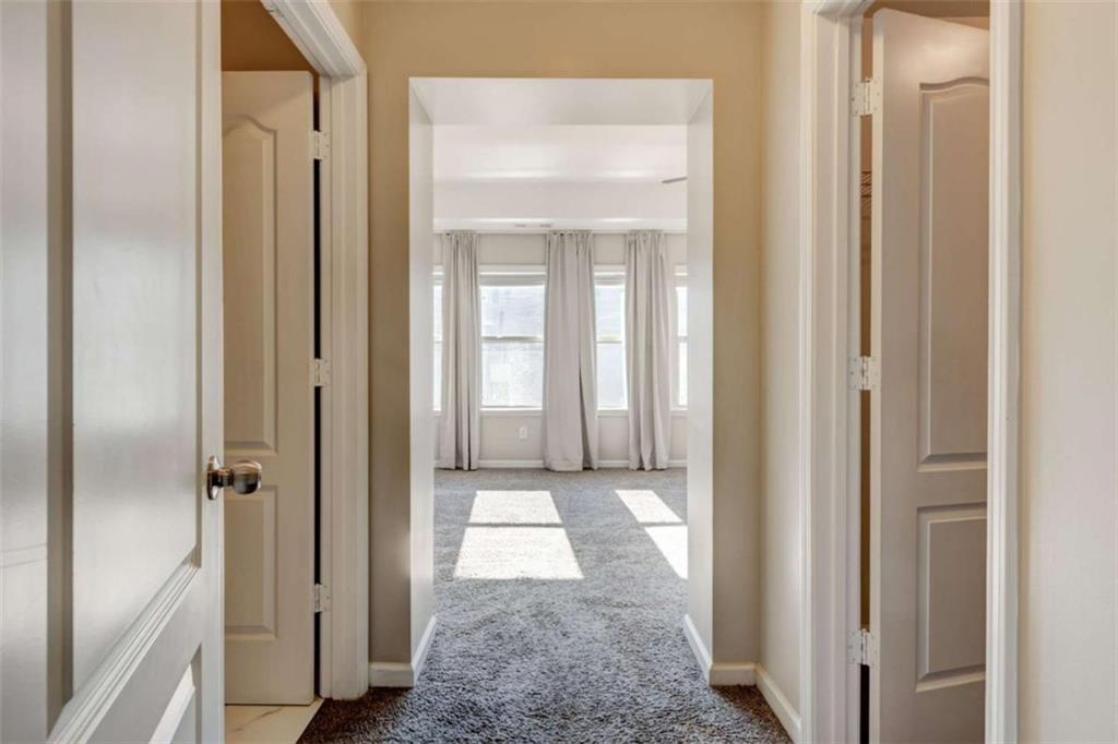 7601 Summer Berry Lane Lithonia, GA 30038 - Photo 20 of 34 a view of a bathroom from a hallway