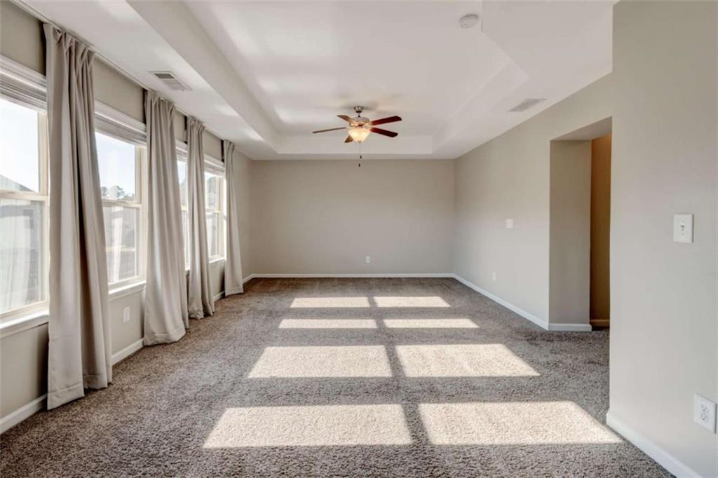 7601 Summer Berry Lane Lithonia, GA 30038 - Photo 23 of 34 wooden floor in an empty room with a window