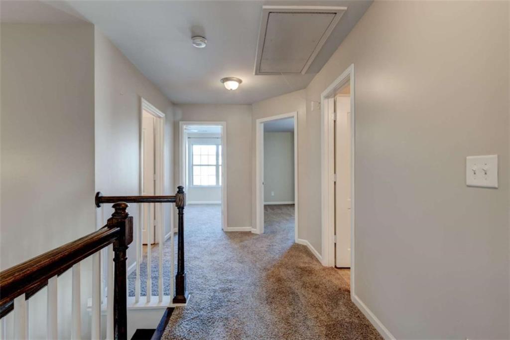 7601 Summer Berry Lane Lithonia, GA 30038 - Photo 29 of 34 a view of a hallway with windows